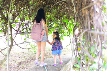 Little Girl and Mother at The Public Park