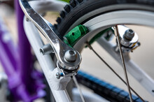 Selective Focus On Peddle Bike Brake Pads On Back Tire Rim