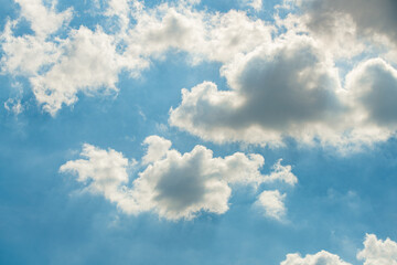 Blue sky background with clouds.	