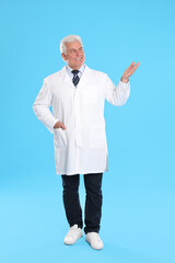 Sticker - Happy senior man in lab coat on light blue background