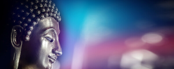 Selective focus  close-up shots of of the Buddha images with soft light and layout design for a beautiful religious background.