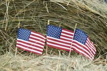 American Flags On A Hay Bale