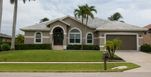 Typical Private Home At An Affluent Residential Area On Marco Island, Florida.