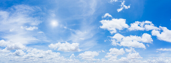 Wall Mural - panorama blue sky and clouds with sun and daylight natural background.