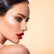 © Valua Vitaly - Beautiful white girl with a red lipstick on lips. Stunning brunette girl with long black hair. Closeup face of young beautiful woman with a healthy clean skin. Pretty woman with bright makeup