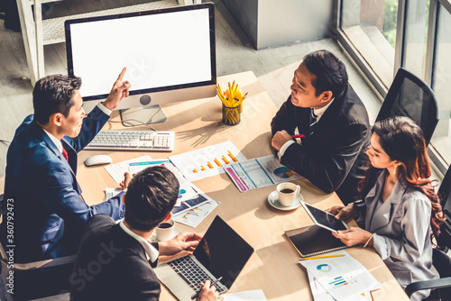Fotomural Smart businessman and businesswoman talking discussion in group meeting at office table in a modern office interior