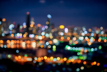Abstract Night Cityscape Light Bokeh In Twilight Blue Hours Sky