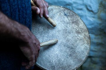 Traditional drummer in festive activities during Carnival celebrations in Naxos island, Greece, Europe.  