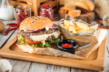 Wall Mural - Delicious burger with lamb cutlet and vegetables