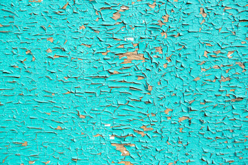 blue and turquoise old Board with cracks from old paint, vintage grunge style with cracked surface background for your text, decoration or advertising template, retro art