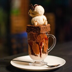 Poster - Glass of special dessert with ice cream and chocolate cake