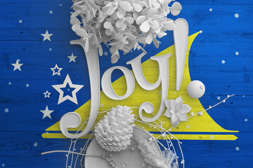 Wall Mural - Tokelau flag on wooden table with Joy text. Christmas and new year background, celebration national concept with white decor.