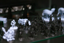 Role-playing Game Board Game With Miniatures With A Dragon In The Dungeons.