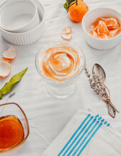 Greek Yogurt With Honey Dessert. Yogurt With Honey, Orange And Lavender. White Background And Greek Blue Color.