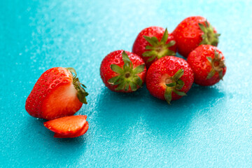 Strawberries on a cutting board.