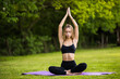 © F8  \ Suport Ukraine - Girl do yoga pose at the park in the morning