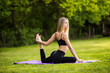 © F8  \ Suport Ukraine - Young fit woman doing yoga in morning park