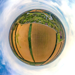 the plain in the vicinity of the village of nizhny khutor - the kipili river and wheat fields on a h
