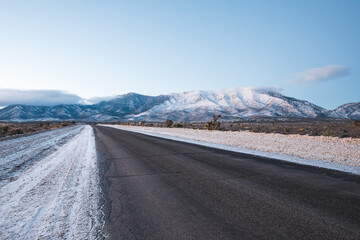 Poster - asphalt road in winter landscape