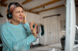 © Anatoliy Karlyuk - Portrait of annoyed displeased student girl learning online from home wearing wireless headset, grimacing, touching ear, having problems with sound quality, sitting in front of desktop computer