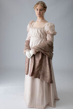 A Young Regency Period Woman In A Pale Pink Gown