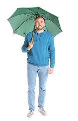 Poster - Handsome young man with umbrella on white background