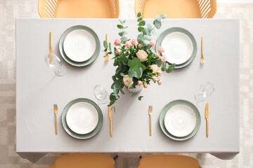 Table served in modern stylish dining room, top view