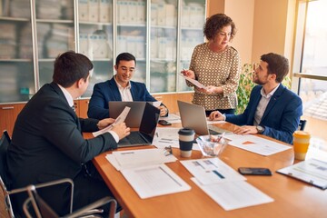 Wall Mural - Business lawyers workers meeting at law firm office. Professional executive partners working on finance strategry at the workplace