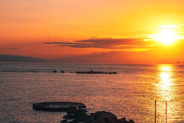 Poster - Sea during the bright orange sunset