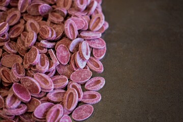 Wall Mural - Closeup shot of pink round-shaped candies