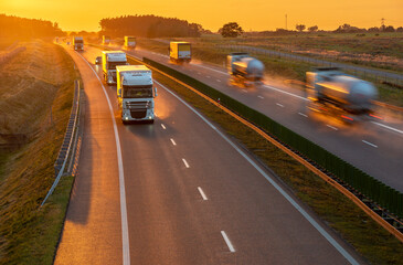 Wall Mural - Heavy traffic on the highway during sunset after heavy rain