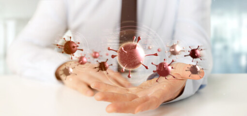 Wall Mural - Businessman holding a Group of red virus cell - 3d rendering