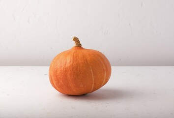 Poster - Closeup shot of pumpkin on a white background