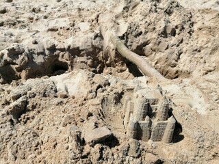 Poster - Top view of a beach sand castle on a sunny day