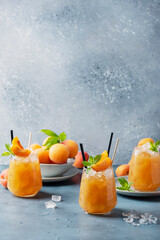 Poster - Fresh apricot cocktail with ice and mint