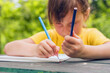 © zwiebackesser - Portrait of cute little child girl with colored pencils. Horizontal image. Selective focus on pencil.