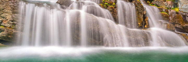 Wall Mural - panorama of lillaz waterfalls near cogne, gran paradiso national park, aosta valley in the alps, ita