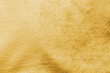 Gold velvet background or golden yellow velour flannel texture made of cotton or wool with soft fluffy velvety satin fabric cloth metallic color material