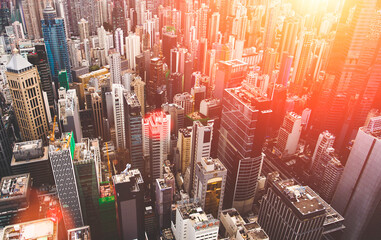 Aerial photo from flying drone of a business district in China with many tall skyscrapers. Top view exterior of office buildings with modern design in developed metropolitan city. Website background