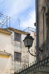 Sticker - Vertical shot of a vintage lamp on the wall of an old building in Corfu, Greece