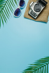 Wall Mural - The beach accessories on the blue and blue background. Summer sale beautiful web banner.