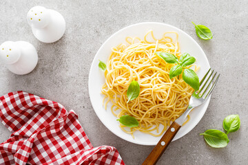 Wall Mural - Pasta. Traditional italian food. Vermicelli with fresh basil