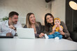 © Daniel - Group of business people in the office with baby girl