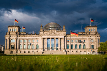 German parliament during sunset and storm