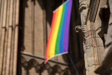 Peterborough, Cambridgeshire, UK, July 2019, A View Of A Pride Flag Hanging From Peterborough Cathedral