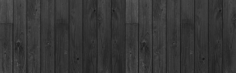 Wall Mural - Panorama of Black wood texture background. Abstract dark wood texture on black wall. Aged wood plank texture pattern in dark tone