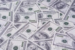 © meeboonstudio - Top view pile of one hundred dollars as background. Texture US dollars.