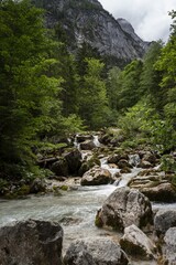 Canvas Print - Beautiful shot of a flowing river in a mountain landscape in Wetterstein, Germany