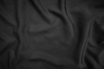 Background texture black cloth. Abstract dark wavy soft. Fabric is wrinkled. Fashion luxury style.