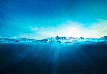 blue ocean underwater , deep ocean, blue water waves with sun beam clear view realistic, world ocean